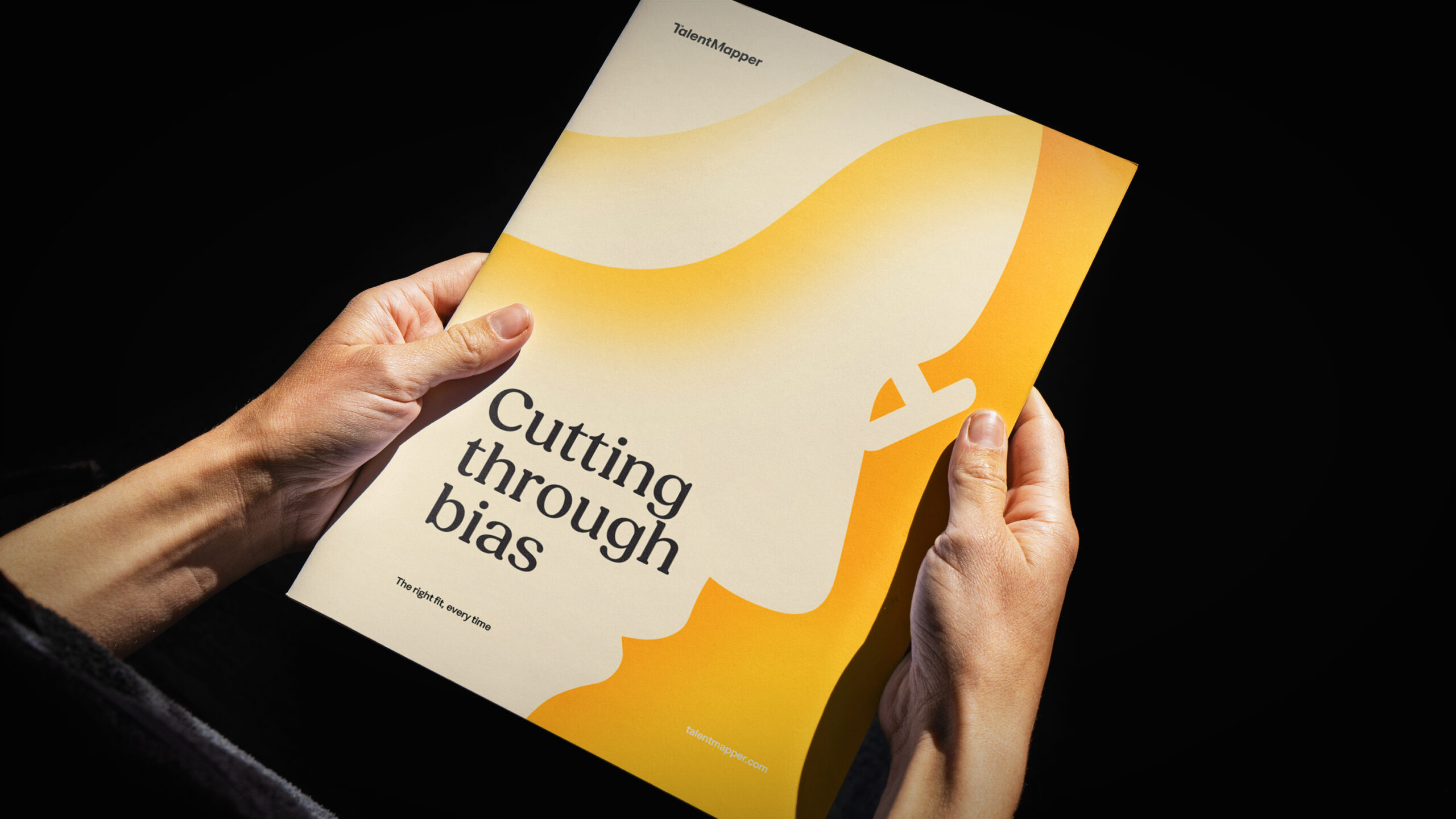 A TalentMapper brochure in hands